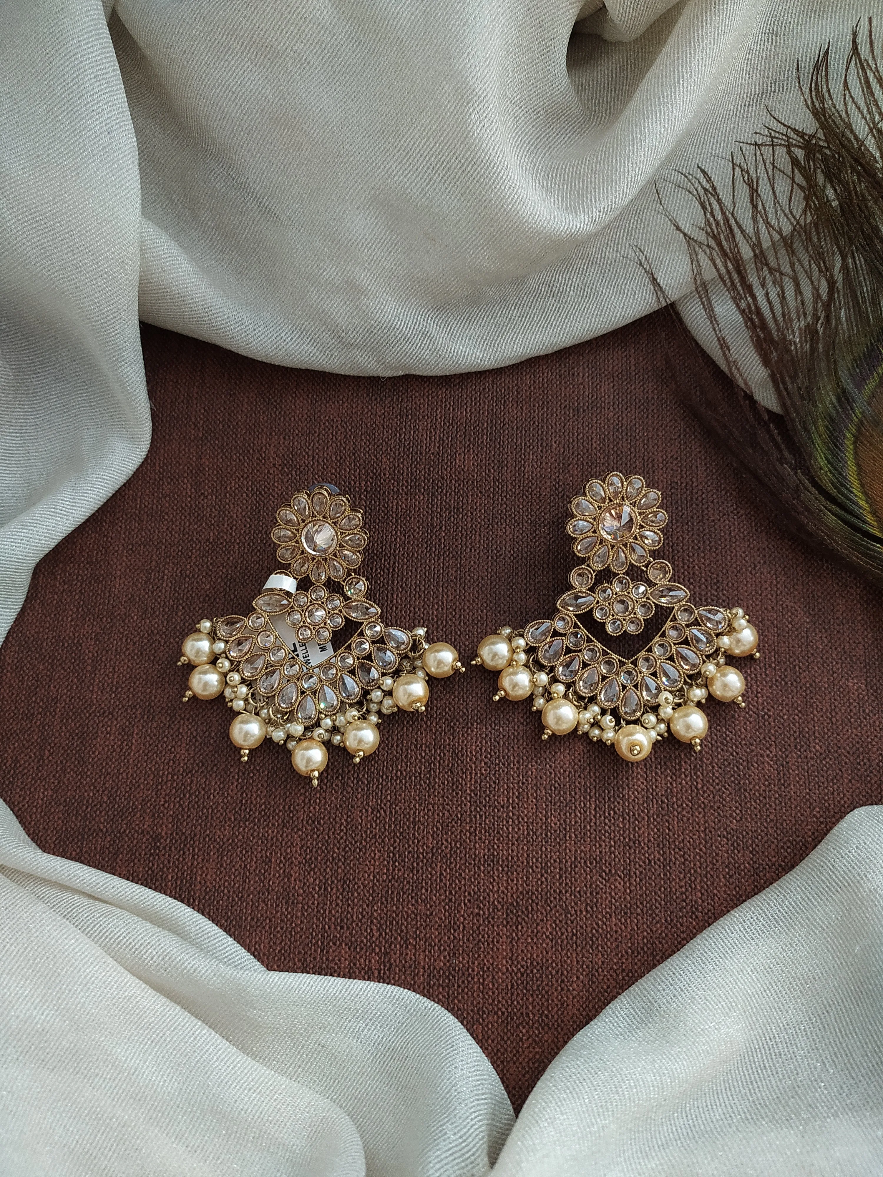 Blossoming Brilliance The Floral Design Uncut Polki Stones Mehendi Earrings